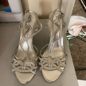 Silver, sparkly heels. I wore them for my homecoming dance